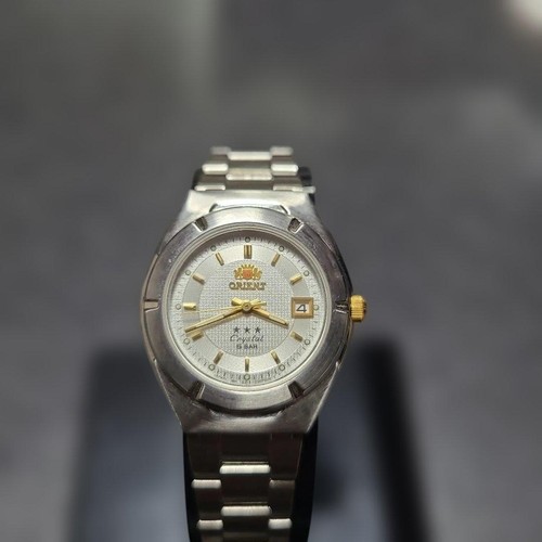 Orient three star tri - three,
